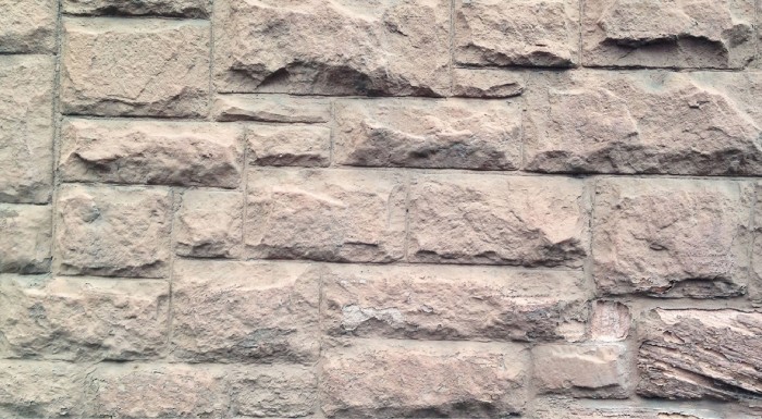 Sandsteinsockel streichen